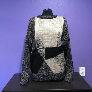 Beige and black geometric knit sweater